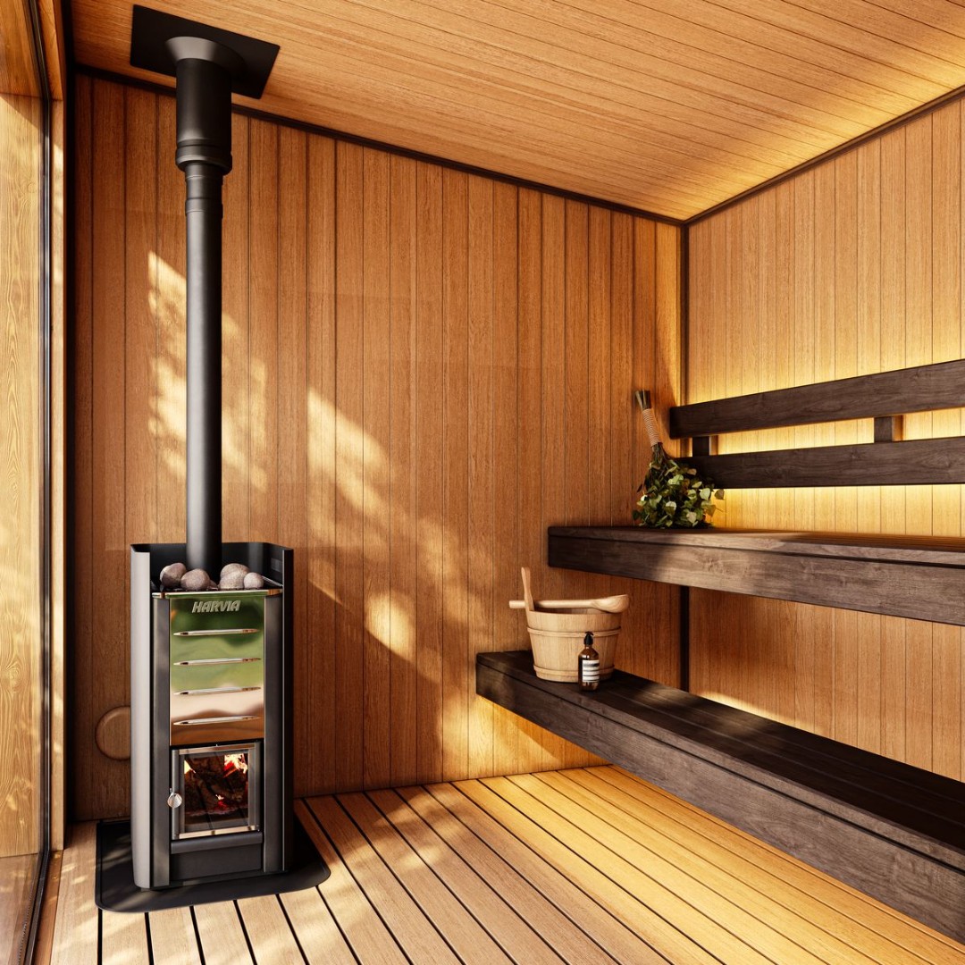 Intérieur du sauna PolarSpa L2 avec bancs en aulne et poêle Harvia haute performance.